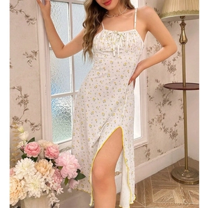 Detail of floral spaghetti strap sleepwear with side slit and yellow contrast trim