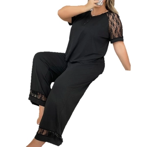 Women's black two-piece pajama set with elegant V-neck and floral lace trims for sleepwear