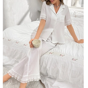 Women white short sleeve lapel pajama set with ruffle trim and vertical stripe texture