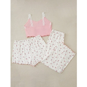 Three-piece floral pajama set with pink lace camisole and patterned trousers and shorts