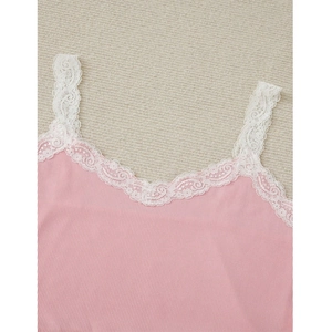 Detail of pink ribbed camisole with delicate white lace trim and adjustable straps