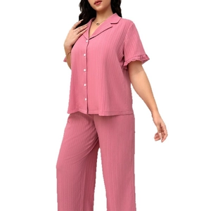 Plus size dark pink loungewear set with short sleeves, lace trim, and ribbed pants