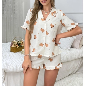 Women's pajama set featuring cartoon bear prints, lapel shirt and ruffle shorts