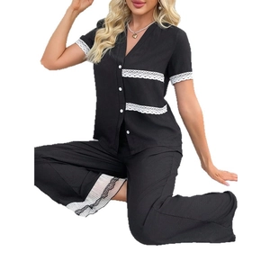 Women's black two-piece pajama set with V-neck short sleeve top and lace-trimmed pants