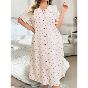 Detailed lace collar and cherry print on a white short-sleeved cotton pajama dress