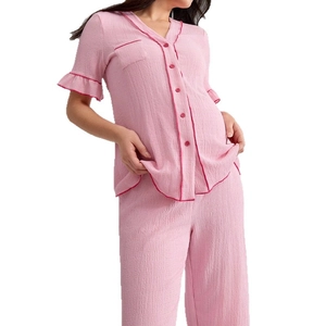 Pink V-neck short sleeve maternity pajama set with ruffled sleeves and crepe texture