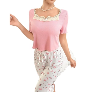 Pink rib-knit short sleeve top with lace trim and floral print lounge pants set