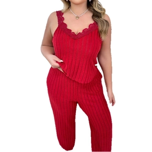 Women's red ribbed knit pajama set with lace trim camisole and matching trousers