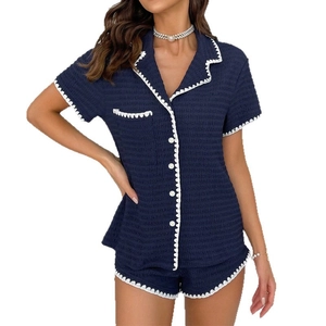 Women's dark blue short sleeve pajama set with texture fabric and white wavy trim