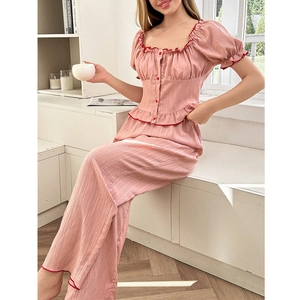 Pink square neck pajama set with red ruffle trim and wide-leg pants for home wear