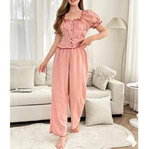 Pink ruffle pajama set with square neck short sleeve top and loose straight pants