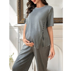 Grey maternity loungewear set with side buttons and side slits for a comfortable loose fit