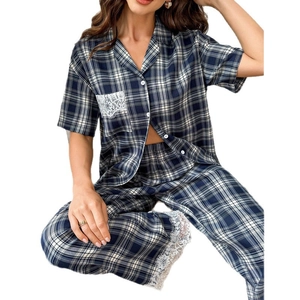 Women's plaid pajamas set featuring short sleeve shirt with lace trim and long pants