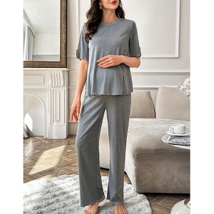 Detail of grey maternity lounge set showing functional side buttons and soft knit fabric
