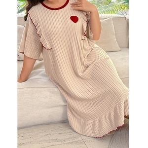 Beige ribbed knit loungewear dress with red heart detail and ruffled edges