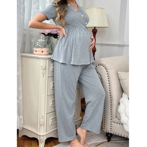 Detailed close-up of grey maternity loungewear set featuring V-neck and soft knit fabric