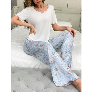 Women's two-piece pajama set with cat print pants and lace trim short sleeve top