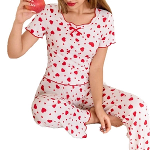 Women's two-piece heart print pajamas set with short sleeve V-neck top and long pants