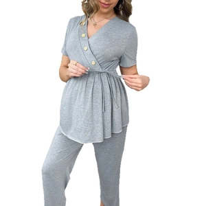 Grey two-piece maternity loungewear set with V-neck wrap top and drawstring pants