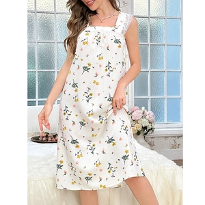 Close-up of floral square neck sleepwear with white lace straps and yellow flower print