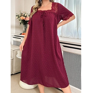 Close-up of wine red lace trim and dobby dot fabric texture on square neck sleepwear