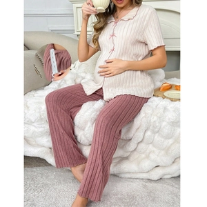Macro detail of adjustable elastic waistband for pregnant women striped pajama set