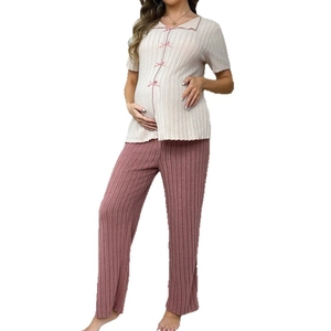 Short sleeve maternity loungewear set with beige top, pink bows and purple pants