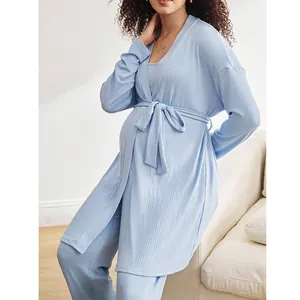 Three-piece light blue maternity loungewear set featuring ribbed cardigan, vest, and pants