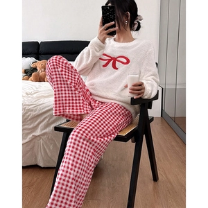 Women's warm two-piece pajama set with white plush top and red gingham pants