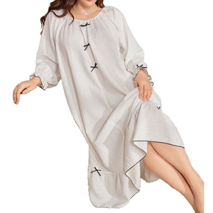 Elegant white plus-size nightgown with black bows and ruffled hem for women