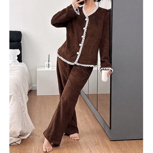 Cozy brown fleece pajama set for women with delicate lace trim and button-down front