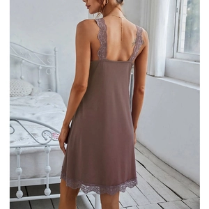Elegant mauve lace nightgown for women with back view silhouette in a cozy bedroom setting