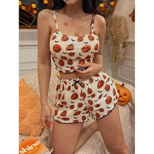 Women's Halloween pajama set with pumpkin print camisole and lettuce trim shorts