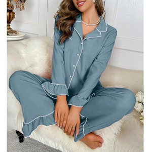 Women's light blue ruffle sleeve pajama set with contrast piping and button-down collar