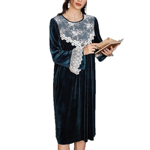 Elegant dark green velvet lounge dress with white lace stitching and long sleeves