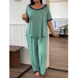 Women's sage green plus size pajama set with short sleeve top, long pants and lace trim