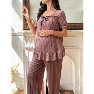 Detail of square neck maternity pajama set in dusty rose with ribbed texture and bow