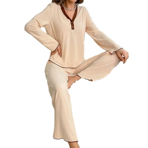 Women's V-neck pajama set in beige with contrast piping and ribbed knit fabric