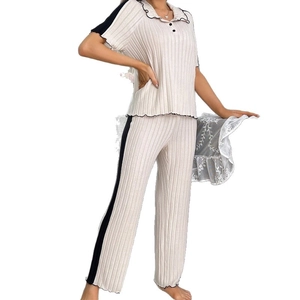 Women's knit pajama set with short sleeve lapel top and striped contrast trousers