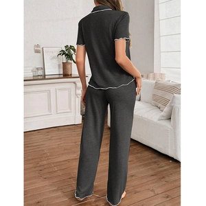 Women's dark gray pajama set with short sleeves, long pants, and white wavy edges