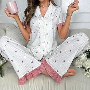 Women's heart print pajama set with short sleeve button-down shirt and long striped pants