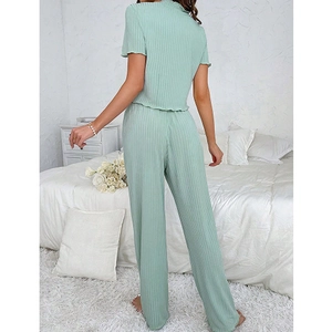 Detail of the back view showing the ribbed knit texture of mint green pajamas set