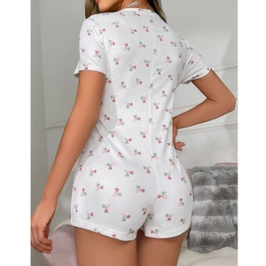 Women's V-neck floral ribbed knit short sleeve romper in white with pink flower print
