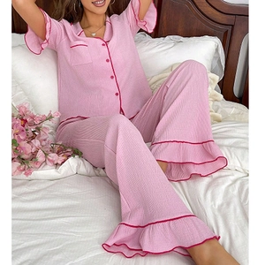 Pink short sleeve pajama set with contrast piping and ruffled hem pants for women