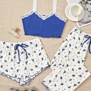 Three-piece floral pajama set with blue camisole top, floral shorts and trousers