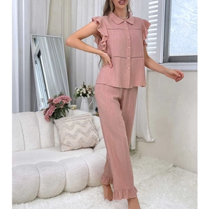 Pink ruffle pajama set for women featuring short sleeves with lapel and long pants