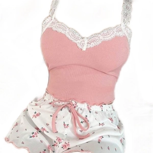 Three-piece women floral pajama set with pink lace camisole and ruffle hem shorts