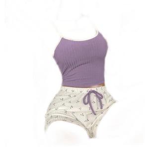 Women's two-piece floral pajama set with purple ribbed camisole and cherry print shorts