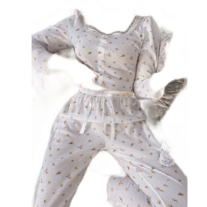 Floral waffle knit pajama set for women with lace trim and long sleeves in cream