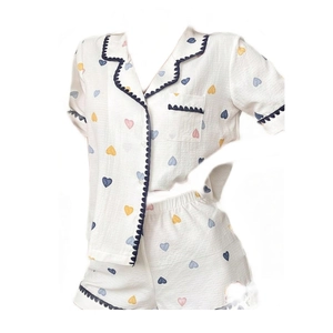 Women's two-piece heart print pajama set with short-sleeved top and matching shorts